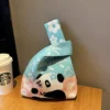 WPBGWB000118 Cute Panda with Flower Color-Blocked Woven Mini Tote Bag